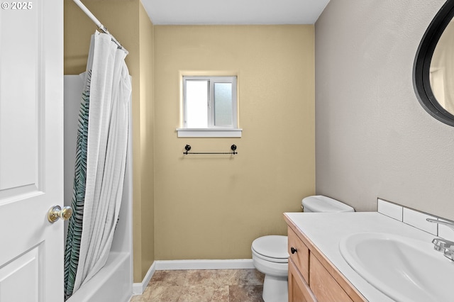 full bathroom featuring vanity, shower / bath combo, and toilet