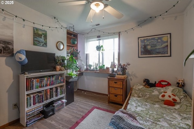 3681 Silverstone Ct NE, Salem, OR 97305 - bedroom featuring baseboards, ceiling fan, visible vents, and wood finished floors