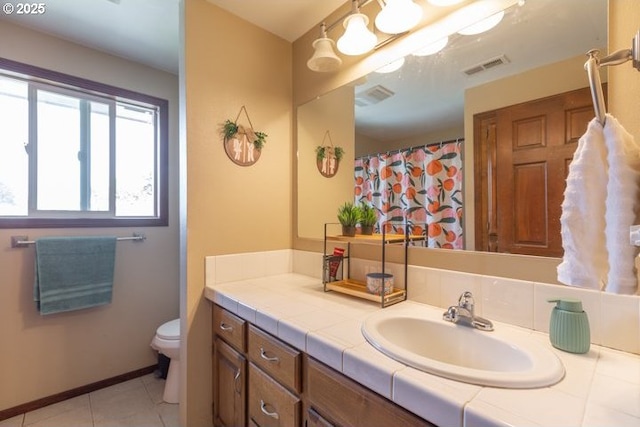3681 Silverstone Ct NE, Salem, OR 97305 - bathroom with toilet, visible vents, tile patterned flooring, and vanity
