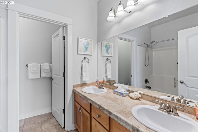 260 N Pacific St, Rockaway Beach, OR 97136 - full bathroom with double vanity, bathtub / shower combination, baseboards, and tile patterned flooring