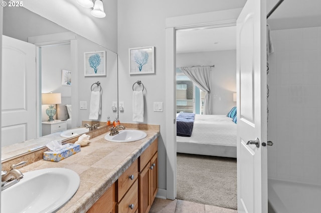 260 N Pacific St, Rockaway Beach, OR 97136 - ensuite bathroom featuring double vanity, tile patterned floors, and washtub / shower combination