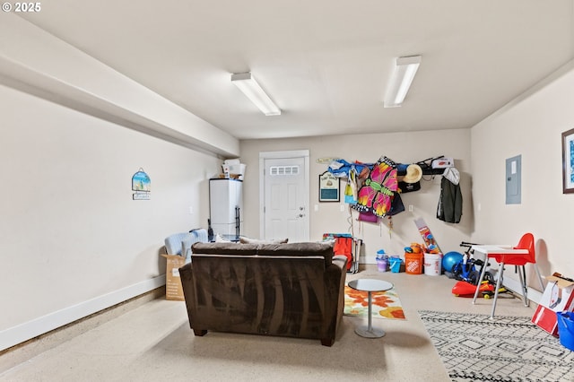 260 N Pacific St, Rockaway Beach, OR 97136 - living area with speckled floor, baseboards, and electric panel