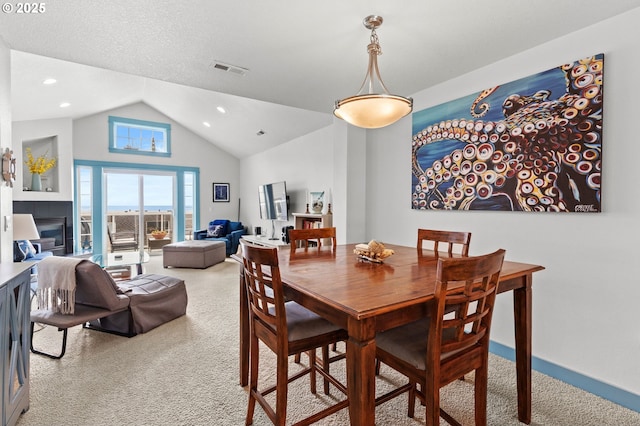 260 N Pacific St, Rockaway Beach, OR 97136 - dining room featuring light carpet, recessed lighting, and high vaulted ceiling