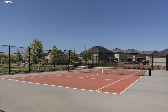 28683 SW Orleans Ave, Wilsonville, OR 97070 - view of tennis court with community basketball court, fence, and a residential view