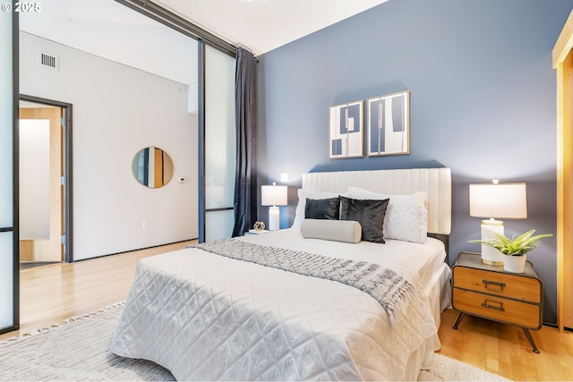 333 NW 9th Ave Unit 713, Portland, OR 97209 - bedroom with wood finished floors