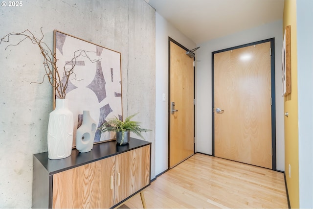333 NW 9th Ave Unit 713, Portland, OR 97209 - hallway featuring light wood finished floors