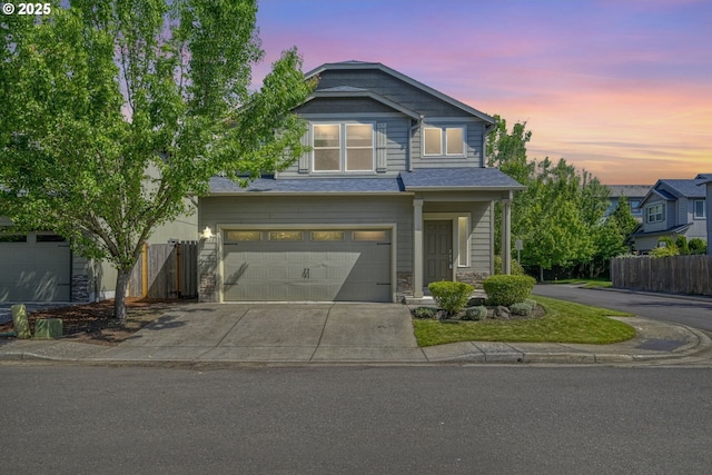 3015 Guadalupe Way, Eugene, OR 97408 - traditional-style house with driveway, a garage, and stone siding