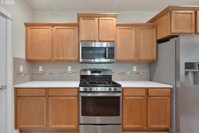 3015 Guadalupe Way, Eugene, OR 97408 - kitchen featuring appliances with stainless steel finishes, light countertops, and backsplash