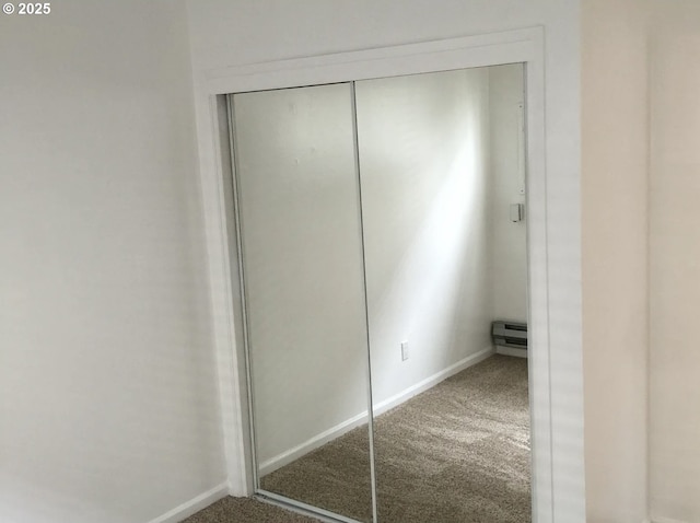 2544 NE Hoyt St, Portland, OR 97232 - closet featuring a baseboard radiator