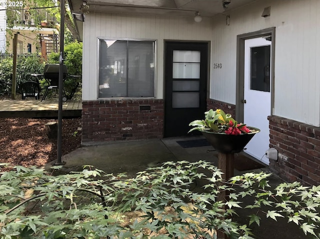 2544 NE Hoyt St, Portland, OR 97232 - property entrance with fence and brick siding