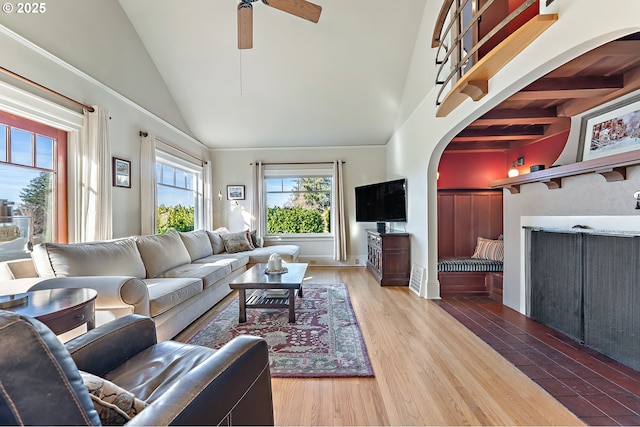 2783 NE Wiberg Ln, Portland, OR 97213 - living room with wood finished floors, ceiling fan, high vaulted ceiling, and arched walkways