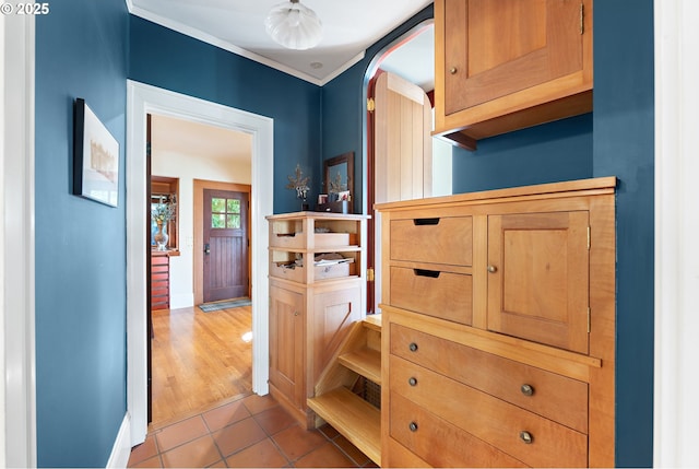 2783 NE Wiberg Ln, Portland, OR 97213 - hall with arched walkways, tile patterned floors, baseboards, and ornamental molding
