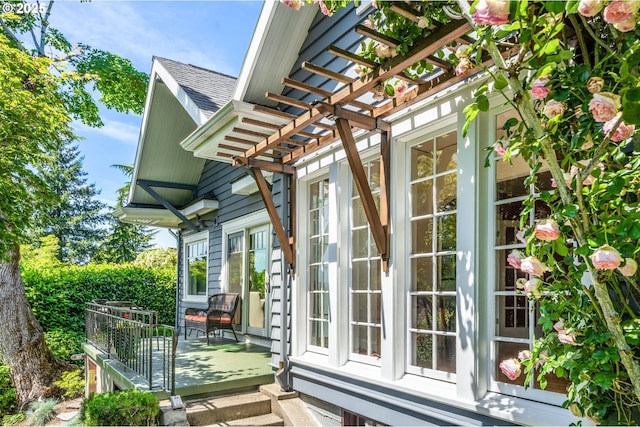 2783 NE Wiberg Ln, Portland, OR 97213 - view of side of home with a pergola and roof with shingles
