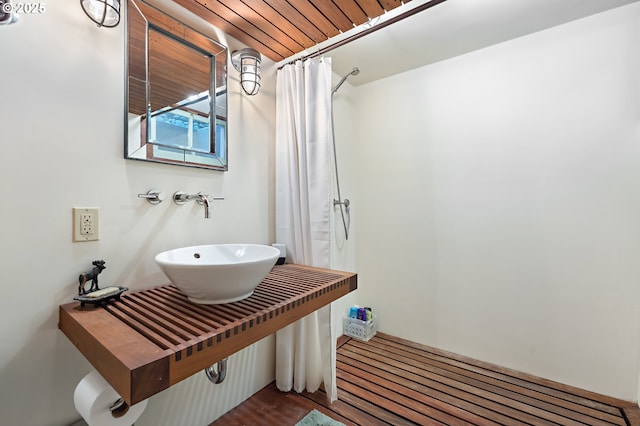 2783 NE Wiberg Ln, Portland, OR 97213 - full bathroom featuring a sink and a shower with shower curtain