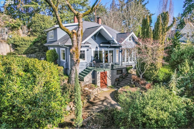 2783 NE Wiberg Ln, Portland, OR 97213 - view of front of house featuring stairs and a chimney