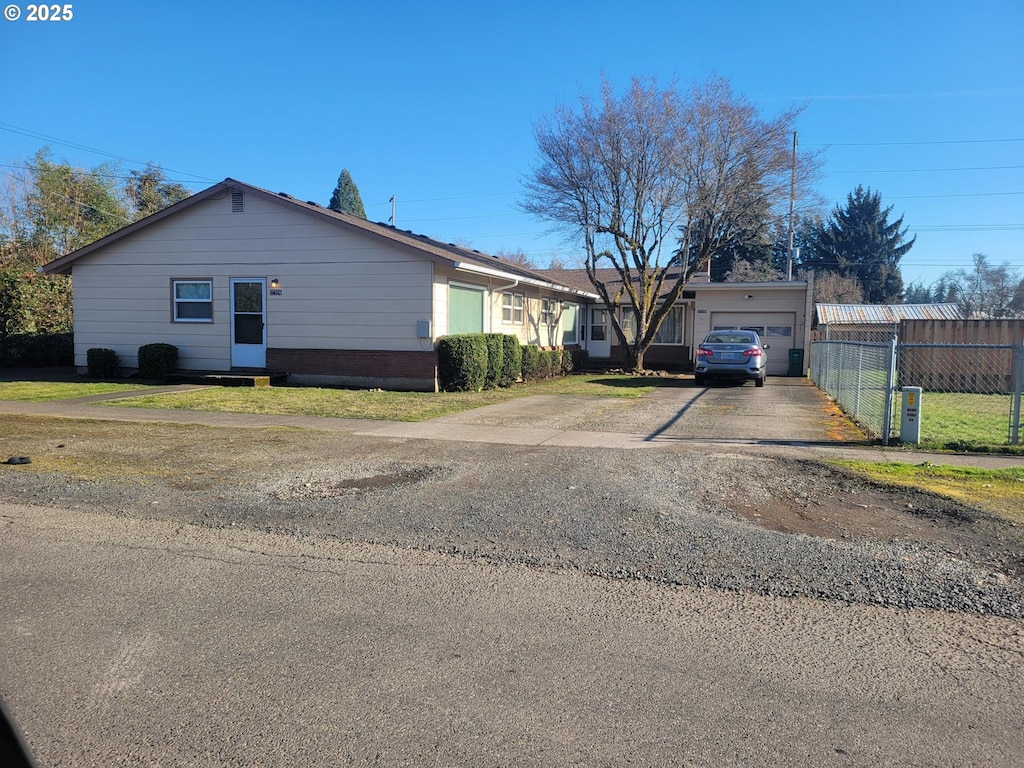 view of side of home featuring a garage