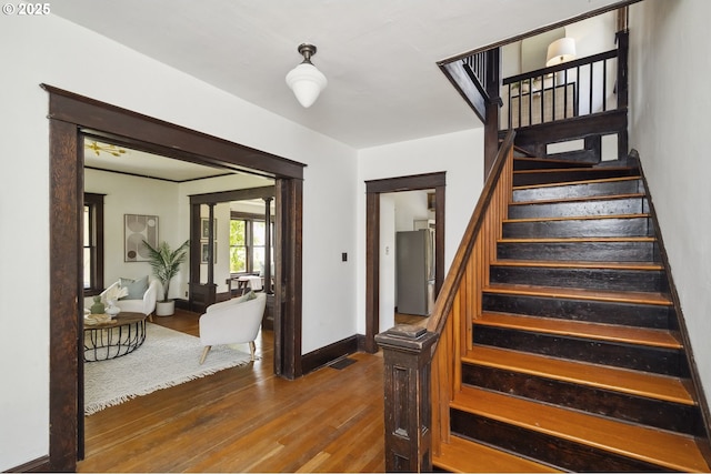 4919 NE 18th Ave, Portland, OR 97211 - stairway featuring wood finished floors and baseboards
