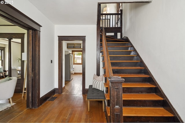 4919 NE 18th Ave, Portland, OR 97211 - staircase featuring hardwood / wood-style flooring
