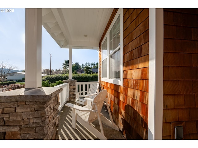 balcony featuring a porch