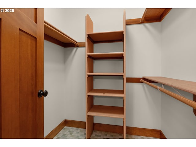 spacious closet with light floors