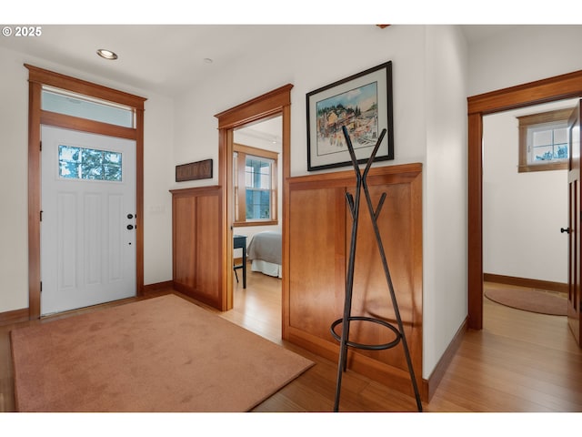 entrance foyer with recessed lighting, baseboards, and light wood-type flooring