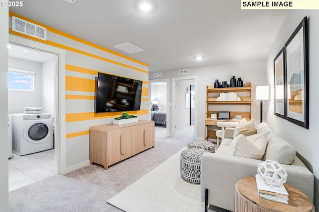 living area featuring light carpet, independent washer and dryer, baseboards, and recessed lighting