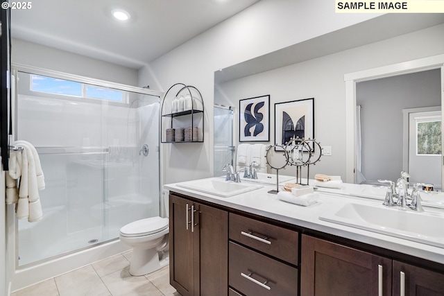 full bath with a shower stall, toilet, double vanity, tile patterned flooring, and recessed lighting