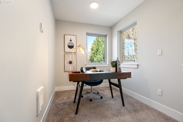 office space with visible vents, baseboards, and carpet flooring