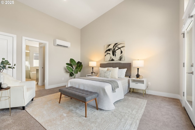 carpeted bedroom featuring ensuite bathroom, high vaulted ceiling, a wall mounted AC, and baseboards