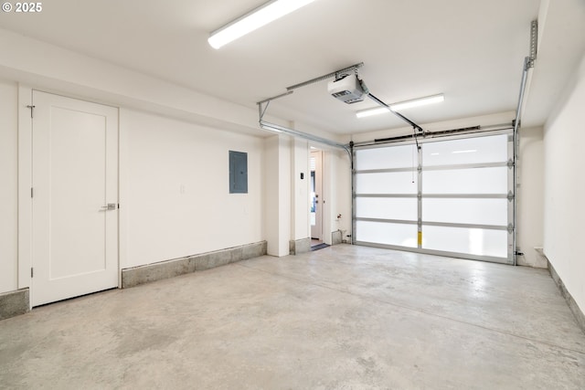 garage with electric panel and a garage door opener