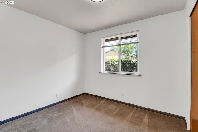 70 Jefferson Aly, Eugene, OR 97402 - empty room featuring carpet floors and baseboards