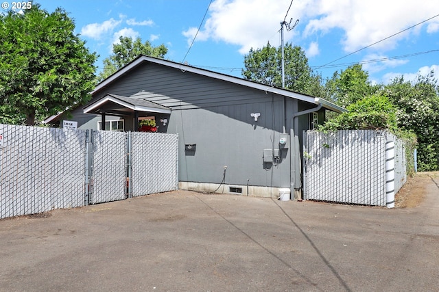 70 Jefferson Aly, Eugene, OR 97402 - view of home's exterior featuring a gate