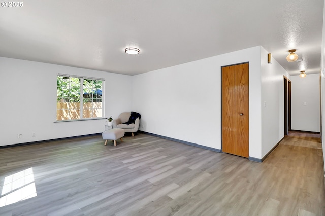 70 Jefferson Aly, Eugene, OR 97402 - unfurnished room with wood finished floors and baseboards