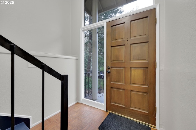 foyer entrance with parquet floors