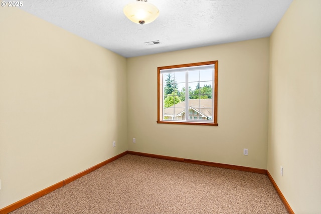 4060 Hampshire Ln, Eugene, OR 97404 - empty room with light colored carpet and a textured ceiling
