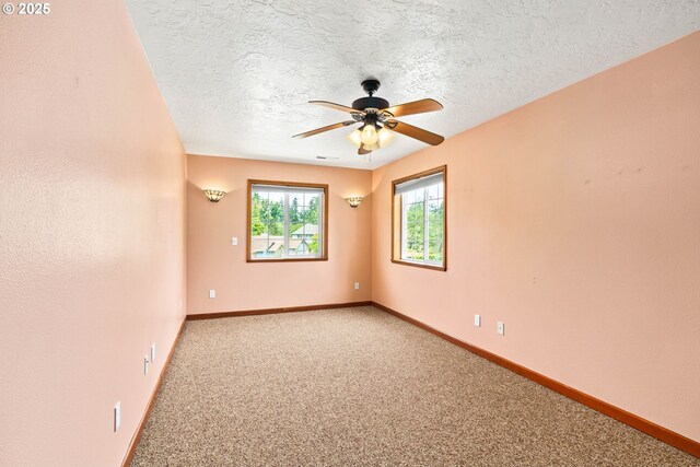4060 Hampshire Ln, Eugene, OR 97404 - carpeted empty room featuring a ceiling fan and a textured ceiling