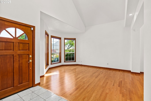 4060 Hampshire Ln, Eugene, OR 97404 - entryway with healthy amount of natural light, high vaulted ceiling, light wood-type flooring, and recessed lighting