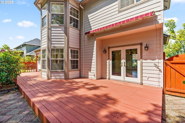 4060 Hampshire Ln, Eugene, OR 97404 - wooden deck with french doors and a gate