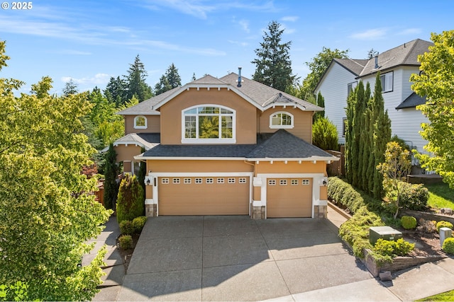 15655 SW Greenfield Dr, Portland, OR 97224 - traditional-style home with stucco siding, stone siding, and a garage