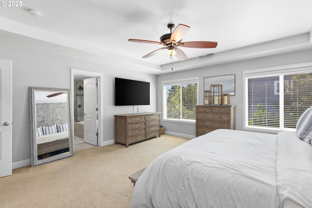 15655 SW Greenfield Dr, Portland, OR 97224 - carpeted bedroom with ensuite bathroom and ceiling fan