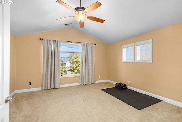 15655 SW Greenfield Dr, Portland, OR 97224 - exercise area with vaulted ceiling, carpet floors, ceiling fan, and plenty of natural light