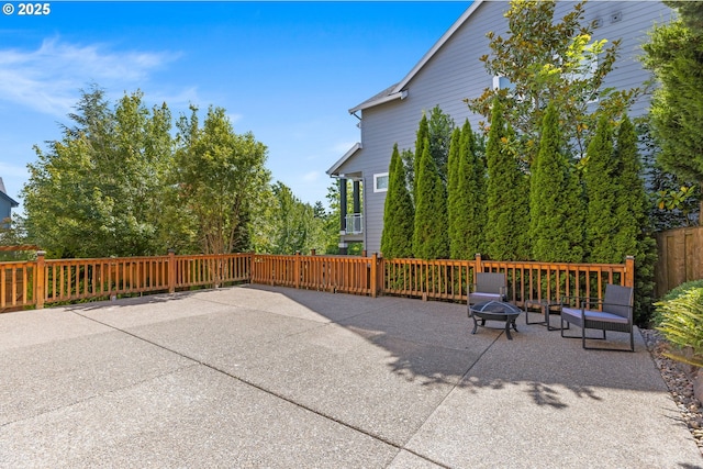 15655 SW Greenfield Dr, Portland, OR 97224 - view of patio / terrace with a fire pit