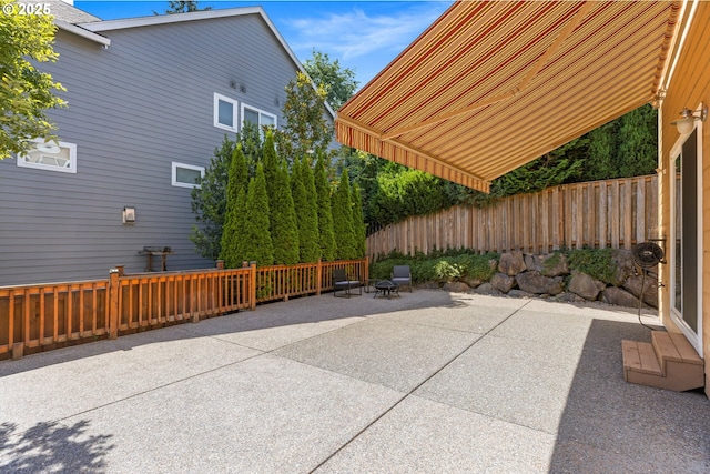 15655 SW Greenfield Dr, Portland, OR 97224 - view of patio / terrace featuring an outdoor fire pit