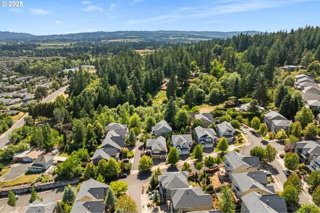 15655 SW Greenfield Dr, Portland, OR 97224 - aerial view of residential area with a mountain backdrop