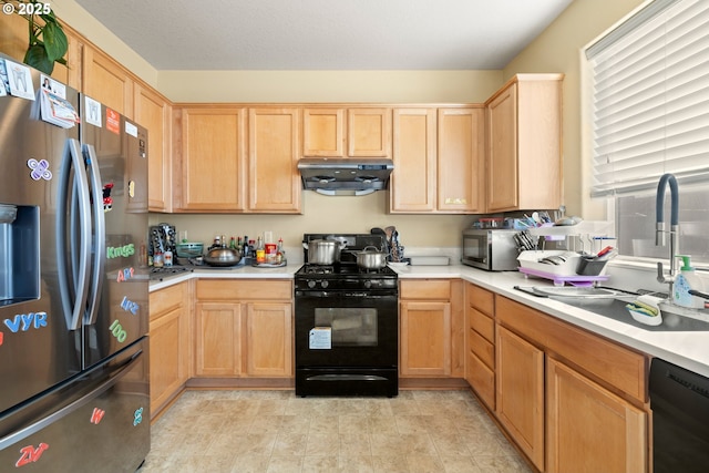 2032 SW 33rd St, Gresham, OR 97080 - kitchen featuring black appliances, a sink, under cabinet range hood, light brown cabinets, and light countertops