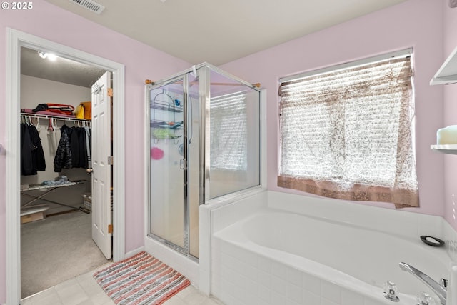 2032 SW 33rd St, Gresham, OR 97080 - bathroom featuring a shower stall, a spacious closet, and a garden tub