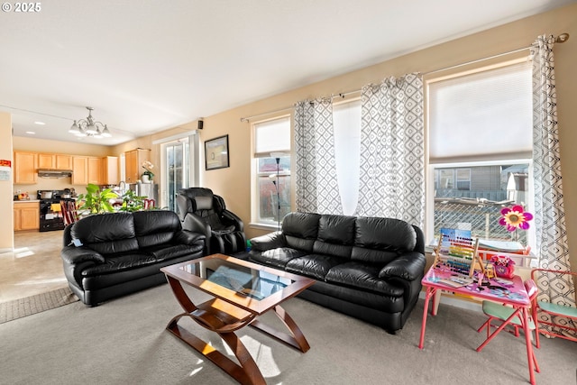 2032 SW 33rd St, Gresham, OR 97080 - living room with a chandelier and light colored carpet