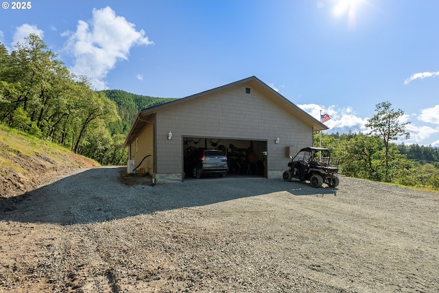 460 Huckleberry Mt Ln, Riddle, OR 97469 - view of side of property with a detached garage