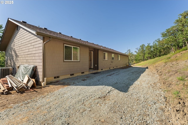 460 Huckleberry Mt Ln, Riddle, OR 97469 - back of house featuring crawl space and central AC