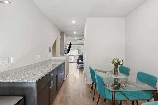 8887 SW Elena Ln, Portland, OR 97223 - dining space featuring light wood finished floors, recessed lighting, and baseboards